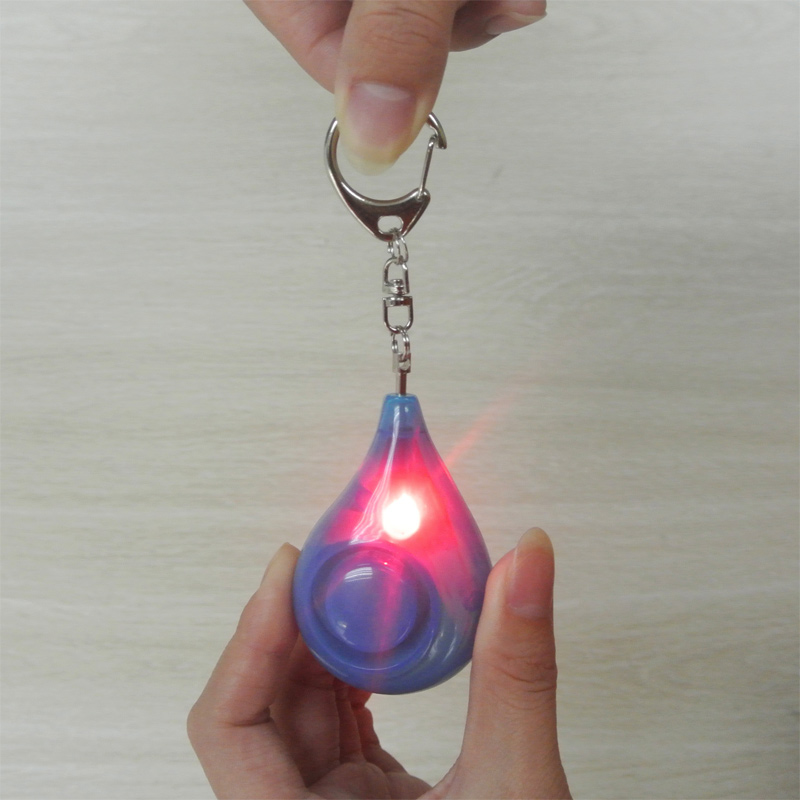 Personal Alarm Keychain - อุปกรณ์ป้องกันการโจรกรรมสำหรับผู้หญิงแบบหยดน้ำ พวงกุญแจเตือนภัยส่วนบุคคลแบบพกพา พร้อมไฟกระพริบสีแดง แจ้งเตือนเหตุฉุกเฉิน